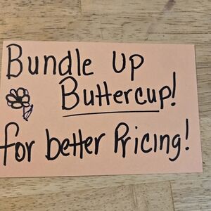 Handwritten Sign on Peach Cardstock